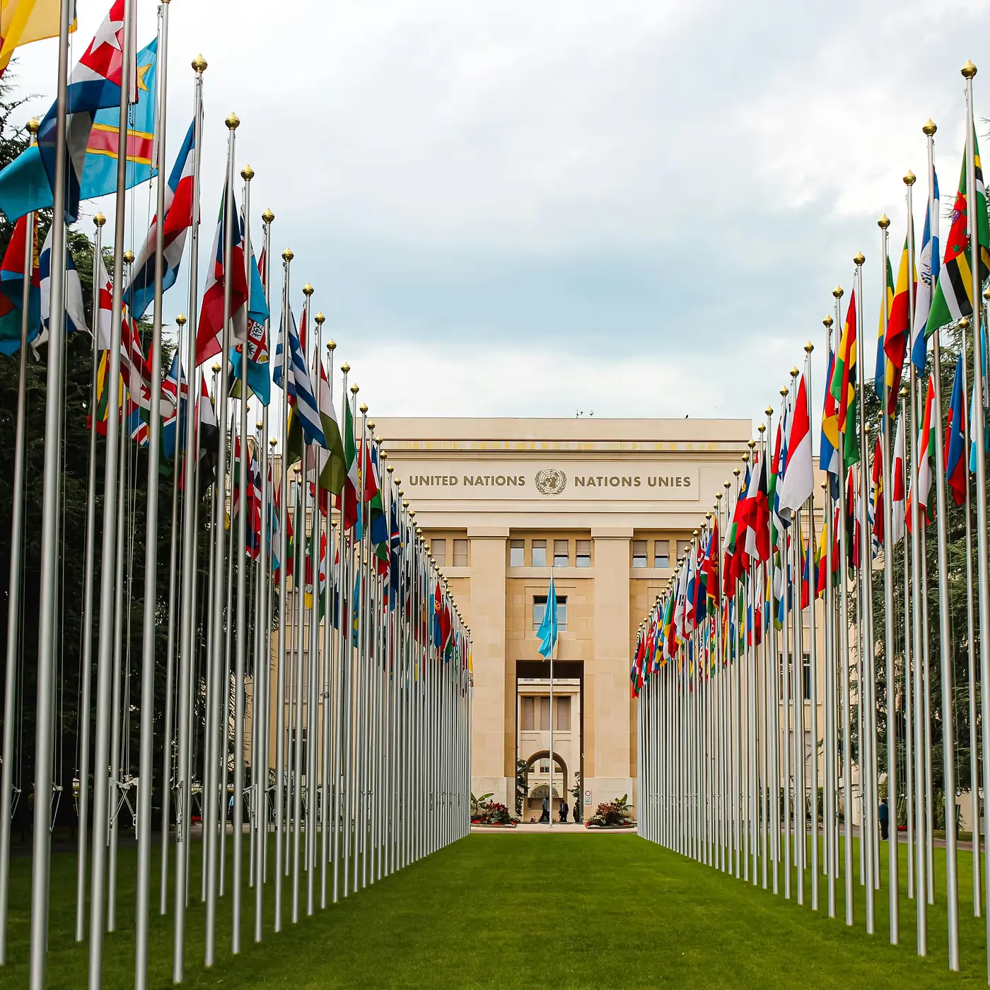Government building with national flags, secured by facial authentication access control